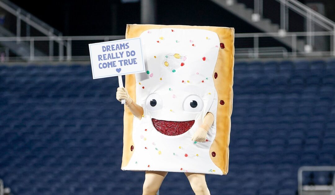 What’s with the edible Pop-Tarts mascot during college football?  Fans are eating up the old ones